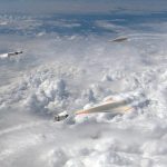 artist rendering of missiles intercepting hypersonic glide vehicles above the clouds