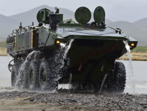 amphibious vehicle drives out of the water