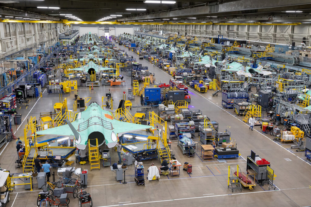 military aircraft sitting on the production floor