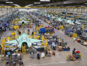 military aircraft sitting on the production floor