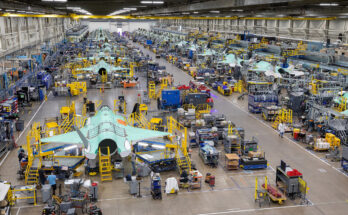 military aircraft sitting on the production floor