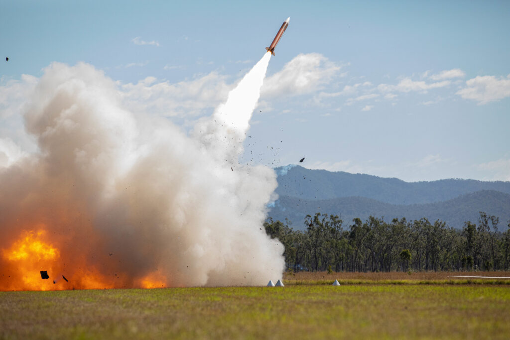 A launcher shrouded in smoke during a missile launch