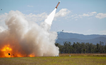 A launcher shrouded in smoke during a missile launch