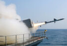 a missile launched from a ship creates a cloud of smoke