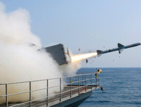 a missile launched from a ship creates a cloud of smoke