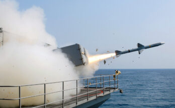 a missile launched from a ship creates a cloud of smoke