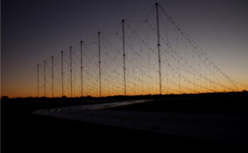 a defense radar array is at dusk