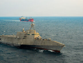 USS Canberra (LCS 30) escorts merchant vessel Seaway Hawk transporting four decommissioned Avenger-class Mine Countermeasures Ships