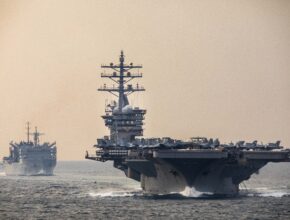U.S. Navy warships transit the Strait of Hormuz