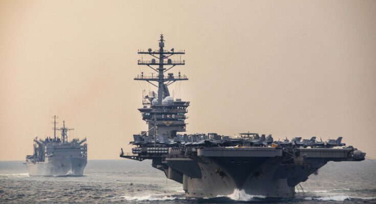 U.S. Navy warships transit the Strait of Hormuz