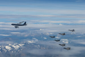 U.S. Air Force F-35A Lightning IIs, F-16 Fighting Falcons, F-22A Raptors and a KC-135 Stratotanker conduct sorties over the Joint Pacific Alaska Range Complex near Eielson Air Force Base, Alaska.