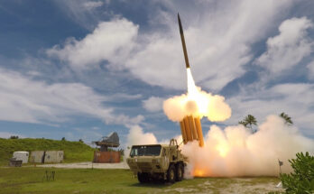 A missile is fired from a ground-based wheeled launch vehicle.